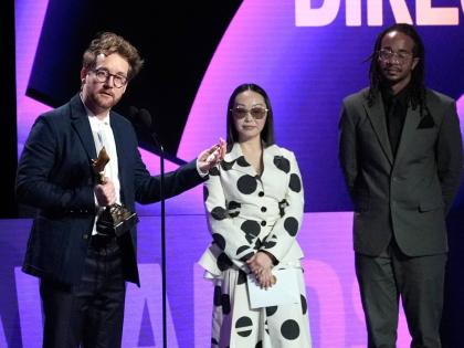Clint Bentley (left) accepts the award for best director for ‘Train Dreams’ during the Film Independent Spirit Awards on Sunday.