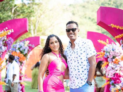 Trinidadian designer Emma Aqui, who created Yard Mas Carnival’s Starry Night costume, pauses for a photo op with Gen XS director Kibwe McGann.