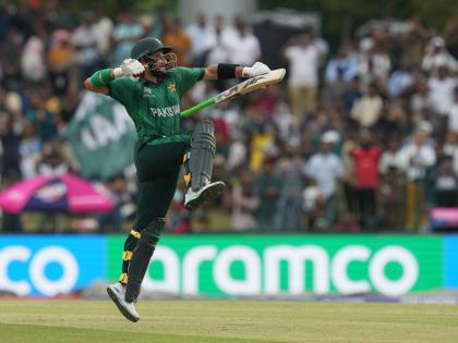 Pakistan’s Sahibzada Farhan celebrates his century during the T20 World Cup cricket match against Namibia in Colombo, Sri Lanka, yesterday.