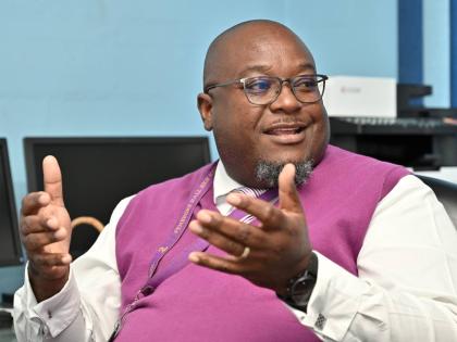 Reverend Claude Ellis, principal of the St Andrew-based Pembroke Hall High School.