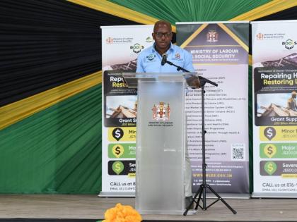 Pearnel Charles Jr, minister of labour and social security, addressing beneficiaries under the Restoration of Owners or Occupants Family Shelter programme at Sean Lavery Faith hall in Savann-la-Mar, Westmoreland, on Thursday. 