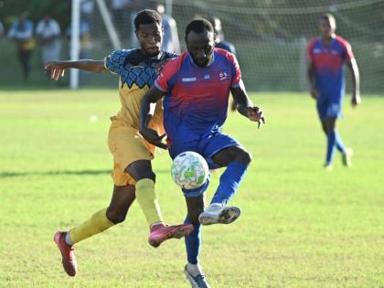 Dunbeholden’s Damion Binns (right).