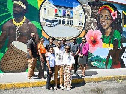 Front row, from left: Coral Williams, Target 8.9 Destinations Manager; Mayor of Montego Bay Richard Vernon; and Tova Hamilton, State Minister in the Ministry of Tourism, are joined by western artists and stakeholders in front of the mural “Deep Cultural 