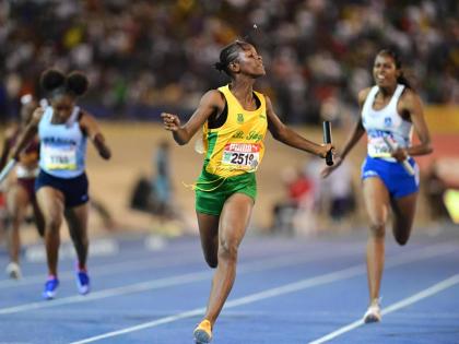 St Jago’s Class 3 team on the way to winning the 4x100 metres at the ISSA/GraeKennedy Boys and Girls’ Athletics Championships in 2024.