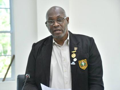 Chief Public Health Inspector for Westmoreland, Steve Morris, delivering remarks during the Westmoreland Municipal Corporation’s recent monthly meeting in Savanna‑la‑Mar.