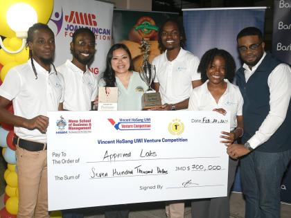 From left: Raheem Williams and Damion Henry of Approved Labs; Simone HoSang, chief operating officer of Caribbean Food Delights, title sponsor and long-standing partner of the Vincent HoSang UWI Venture Competition; Akeem Hutchinson, CEO of Approved Labs; 