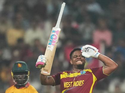 West Indies’ Shimron Hetmyer celebrates scoring a half century during the T20 World Cup cricket match against Zimbabwe on Monday.