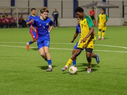 Jamaica Under-20’s Jahmarie Nolan turns away from Bonaire defender Ivar Bakelaar during the Concacaf Under-20 Qualifier at the Stadion Rignaal ‘Jean’ Francisca in Willemstad, Curaçao on Monday. Nolan was a scorer in yesterday’s 7-0 hammering of Tu