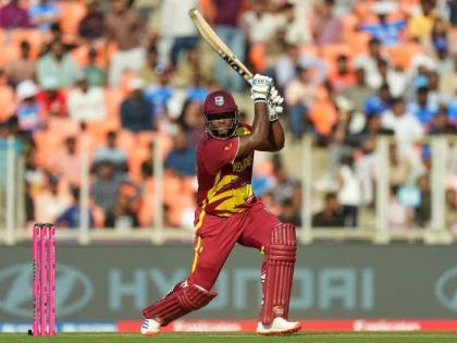 West Indies’ Romario Shepherd plays a shot during the T20 World Cup cricket match between South Africa and West Indies in Ahmedabad, India yesterday.  Shepherd made 52 not out.