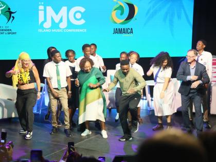 
Minister of Culture, Gender, Entertainment and Sport Olivia Grange challenged students to a dance-off on stage during the opening of the Island Music Conference on Wednesday. 