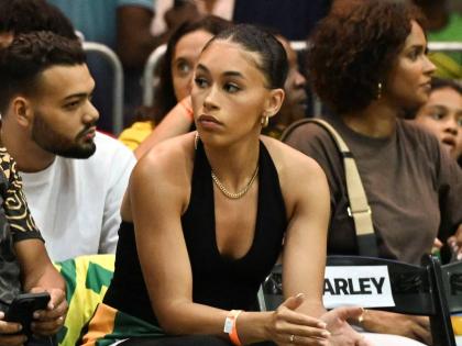 The girlfriend of Jamaica’s Chase Audige, Alia Moore, shows support for the basketballer during a FIBA World Cup basketball qualifier against Canada inside the National Indoor Sports Centre on Sunday.