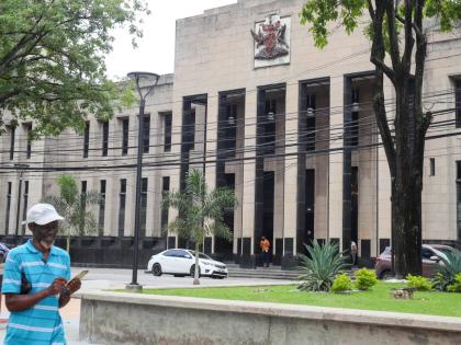 The country's coat of arms is displayed on the facade of a government building in Port-of-Spain, Trinidad and Tobago, Tuesday, August 20, 2024.