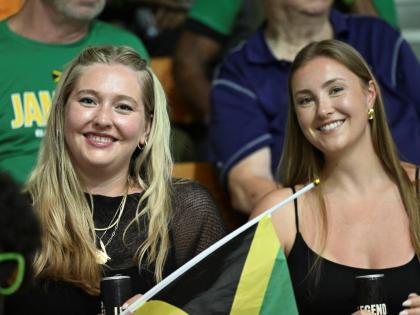 Jamaica’s basketball coach, Rick Turner’s daughter, Scout (left), was a constant in the stands for the island’s pair of FIBA Americas World Cup Qualifer at the National Indoor Sports Centre. 