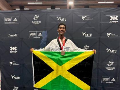 Daniel Balli celebrates winnina bronze medal at the 2026 Canada Open G2, held in Calgary, Canada, over the weekend.