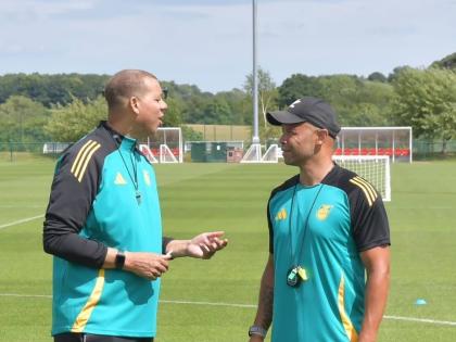 From left: Reggae Boyz head coach, Hubert Busby Jr, and his assistant Deon Burton during a training session.