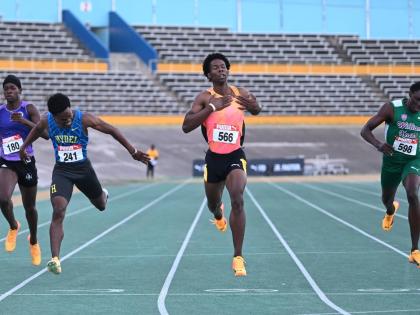 Zachary Wallace (second right), unattached, wins the under-20 400 metres at the Carifta Trials on the weekend with a personal best of 45.77. He finished ahead of Junior Gallimore (second left) of Hydel, who placed the second with a personal best of 45.87. 
