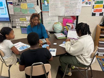 Kay‑Ann Bartley works with a small group of grade five students in Cumberland County, North Carolina.