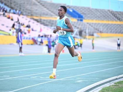 Denbigh High School’s Markland Williams wins the boys’ under-17 800 metres at the Carifta Trials inside the National Stadium on Sunday. 