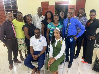 Sandrene Hill-Sherwood (seated right), president of the Hanover Justices of the Peace Association, and the members of her executive.