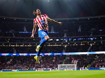 Atlético Madrid’s Robin Le Normand celebrates after scoring his side’s fourth goal during the first leg of the Champions League round-of-16 football match against Tottenham in Madrid, Spain, yesterday.