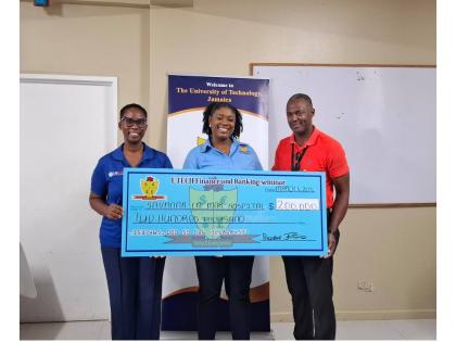 Roan Grant (right), CEO of the Savanna-la-Mar Public General Hospital, and Parish Manager for Public Health Services, Novlin Leslie-Little (left), accept a cheque from Kristina Johnson (centre), second vice-president of the University of Technology’s (UT