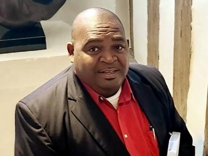 Keith Darien, principal director of the Financial Investigations Division.