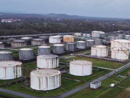 Big oil tanks are pictured in front the BP refinery in Gelsenkirchen, one of the biggest fuel producers in Germany, Wednesday, March 11, 2026. (AP Photo/Martin Meissner)