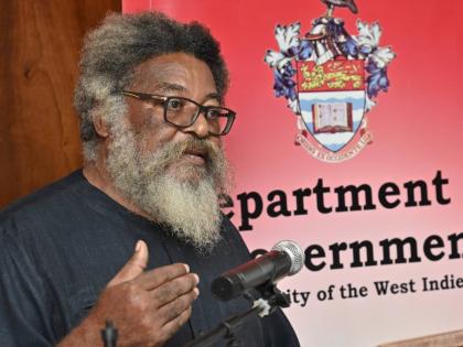 Dr Louis Moyston speaks on the theme ‘The resurgence of US Imperialism in the Region: Target Cuba’; during the Political Moment in the Caribbean Seminar held Wednesday evening at the Department of Government in the Faculty of Social Sciences at The Uni