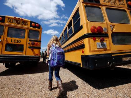 A student prepares to leave school, August 13, 2014, southeast of Brookhaven, Miss. (AP Photo/Rogelio V. Solis, File)