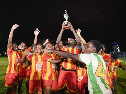 Cornwall College players celebrate winning the 2026 ISSA/Burger King rural Under-16 football title at St Elizabeth Technical High School on Thursday. Cornwall defeated Glenmuir High School 4-1.