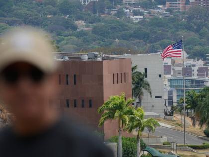 An American flag flies again at the United States Embassy in Caracas, Venezuela, yesterday, seven years after it was lowered when Washington and Caracas cut diplomatic relations in 2019. 