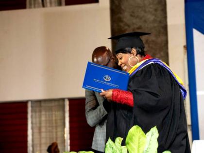 Detective Inspector Pilmar Powell, after receiving her master’s in forensic psychology.