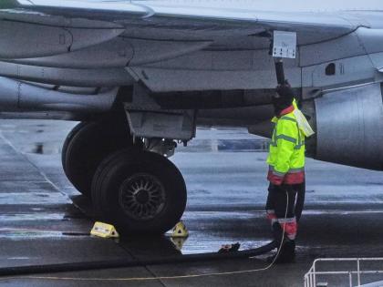  An airplane is refuelled at Seattle-Tacoma International Airport in SeaTac, Wash., on Sunday, November 23, 2025. (AP Photo/Lindsey Wasson, File)