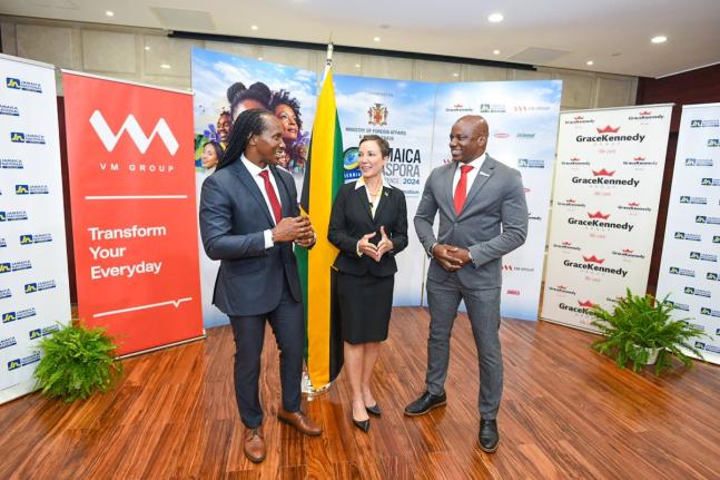 Elon Parkinson (right), head of communications and corporate affairs at Digicel, engages in conversation with Senator Kamina Johnson Smith, minister of foreign affairs and foreign trade, and State Ministe Alando Terrelonge during the media launch for the 1