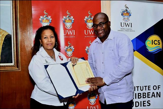 Michelle Williams, VP Records’ regional director of Caribbean and Latin America, and Professor Densil Williams, principal of the UWI, Mona campus, at the launch of the VP Foundation ECEM Scholarship.