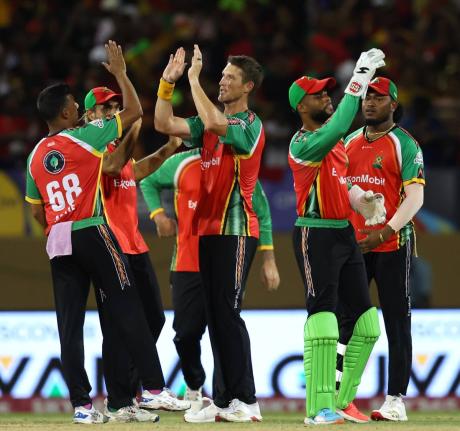 Guyana Amazon Warriors players celebrate.