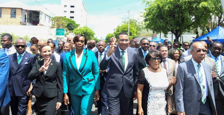 Members of parliament of the Jamaica Labour Party, led by Dr Andrew Holness arrive for the swearing-in ceremony at Gordon House. 