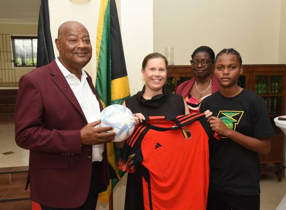From left: Michael Ricketts, president of the Jamaica Football Federation (JFF), Her Excellency Ellen De Geest, Belgian ambassador to Jamaica, Elaine Walker-Brown, president of women’s football in the JFF, and Shauntai Pryce, young Reggae Girl, pose with