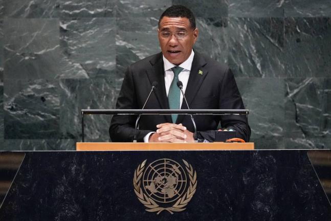 
Jamaica Prime Minister Andrew Holness addresses the 80th session of the United Nations General Assembly in New York, on September 26.