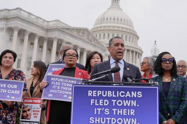 Representative Adriano Espailat speaks during a news conference on the impact of government shutdown on Americans health care on Tuesday at the Capitol in Washington.