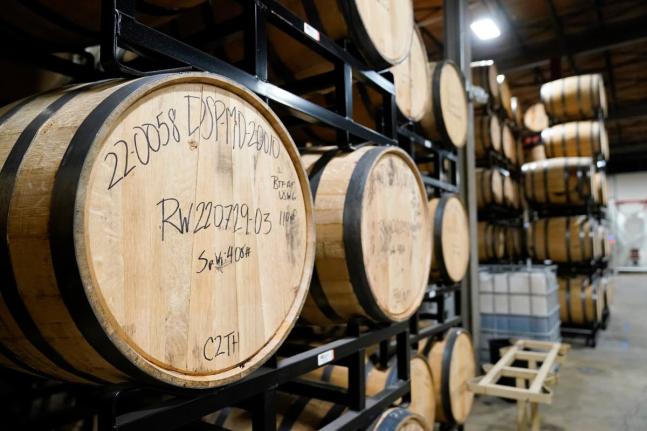 Barrels of spirits are seen at the Baltimore Spirits Company distillery on February 8, 2023 in Baltimore.
