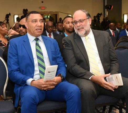 Prime Minister Dr. Andrew Holness (left) and Leader of the Parliamentary Opposition Mark Golding at the 45th Annual National Leadership Prayer Breakfast.