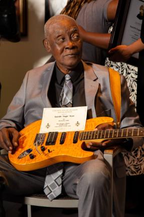 Radcliffe ‘Dougie’ Bryan with his guitar at the 2024 Grammy Certificate Ceremony, Florida, last July.
