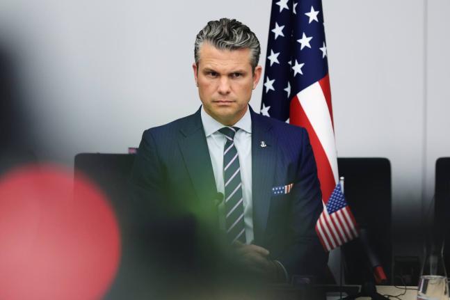 United States Defence Secretary Pete Hegseth addresses a meeting of the Ukraine Defence Contact Group at NATO headquarters in Brussels, Wednesday, October 15, 2025 (AP Photo/Omar Havana)