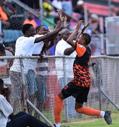 Tivoli Gardens FC’s Nickalia Fuller (right) celebrates with fans after scoring against Dunbeholden in a Lynk Cup match at the Anthony Spaulding Sports Complex on Wednesday, April 12, 2023.