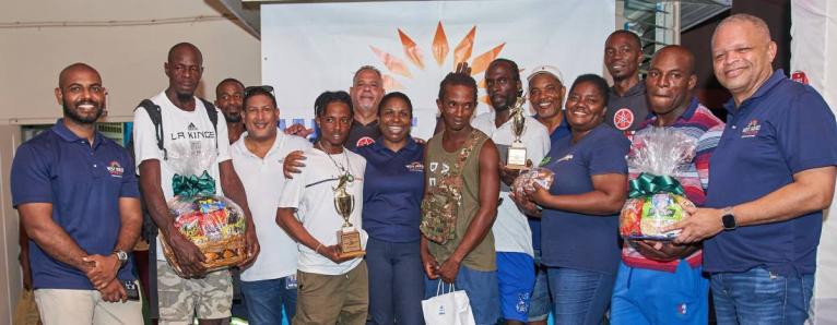  Members of the WIP Team with the first to third  place winners of the 2024 Canoe Tournament.