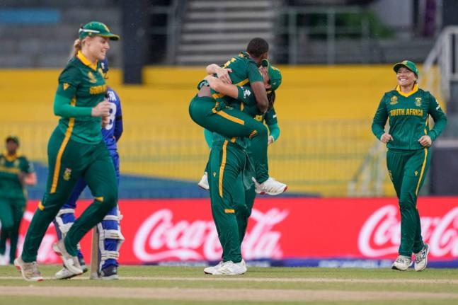 
South Africa’s Masabata Klaas celebrates with teammates the wicket of Sri Lanka’s captain Chamari Athapaththu, during the ICC Women’s Cricket World Cup match at Premadasa Stadium in Colombo, Sri Lanka on Friday.