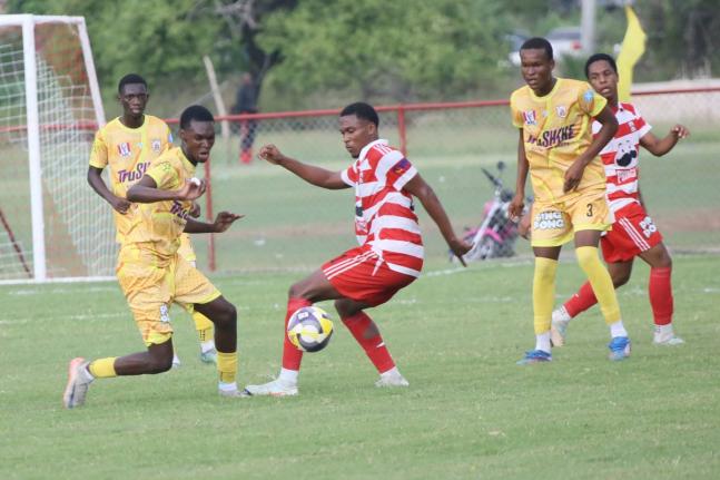 Action between Glenmuir High School and Garvey Maceo during the first round of ISSA daCosta Cup.