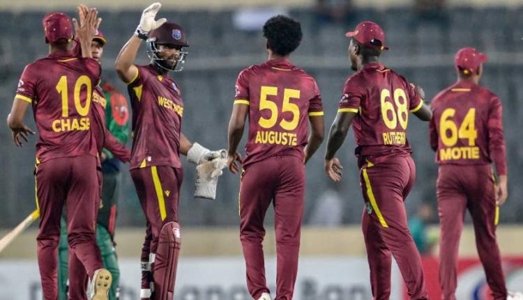 West Indies captain, Shai Hope (second left), celebrates the fall of a Bagladesh wicket during the second One-Day International cricket match at the Sher-e-Bangla National Stadium yesterday.
