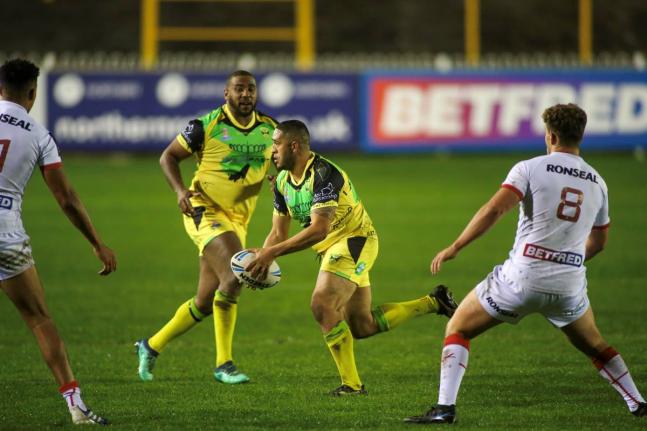 Jamaica’s Reggae Warriors (in gold) in action against England Knights in a rugby league international friendly match at Castleford in Yorkshire, England, on Friday, October 15, 2021.